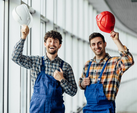 good-looking-construction-worker-sharing-with-the-experience-with-a-colleague-holding-helmet_496169-997 1.png